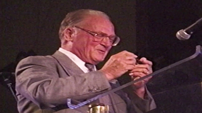 Image of Robert Muller on the harmonica